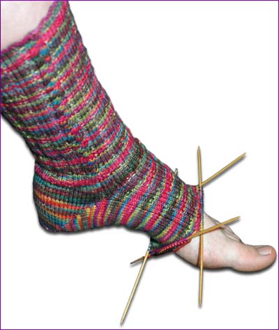 socks that rock, fire on the mountain cabled socks in a slightly later stage